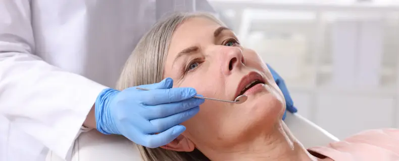 Dentist checking tmj